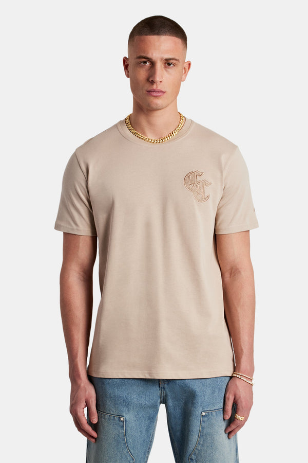 Male Model wearing Taupe T-shirt with C detail