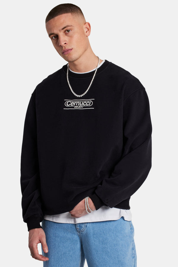 Model wearing the cernucci established embroided sweatshirt in black 