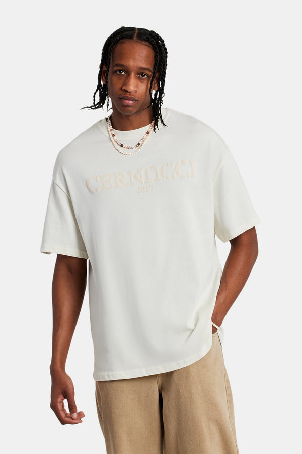 Male model wearing the tonal logo oversized t-shirt in off-white