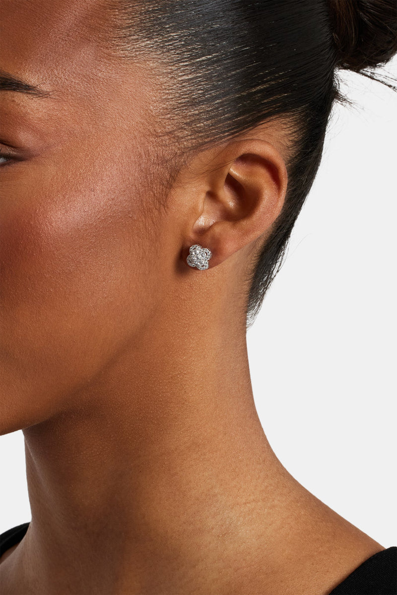 Female model wearing the iced floral motif stud earrings