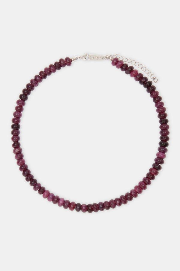 Amethyst bead necklace on white background