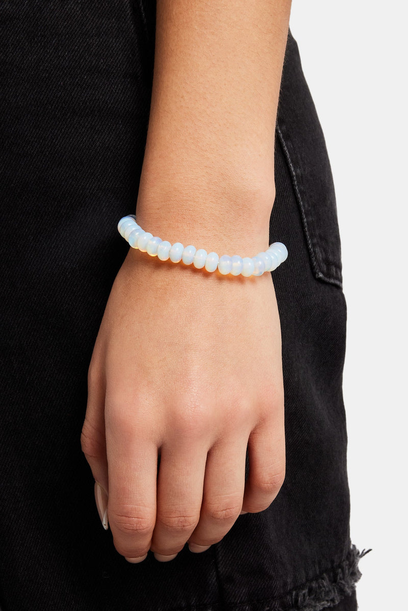 Female model wearing the opal bead bracelet